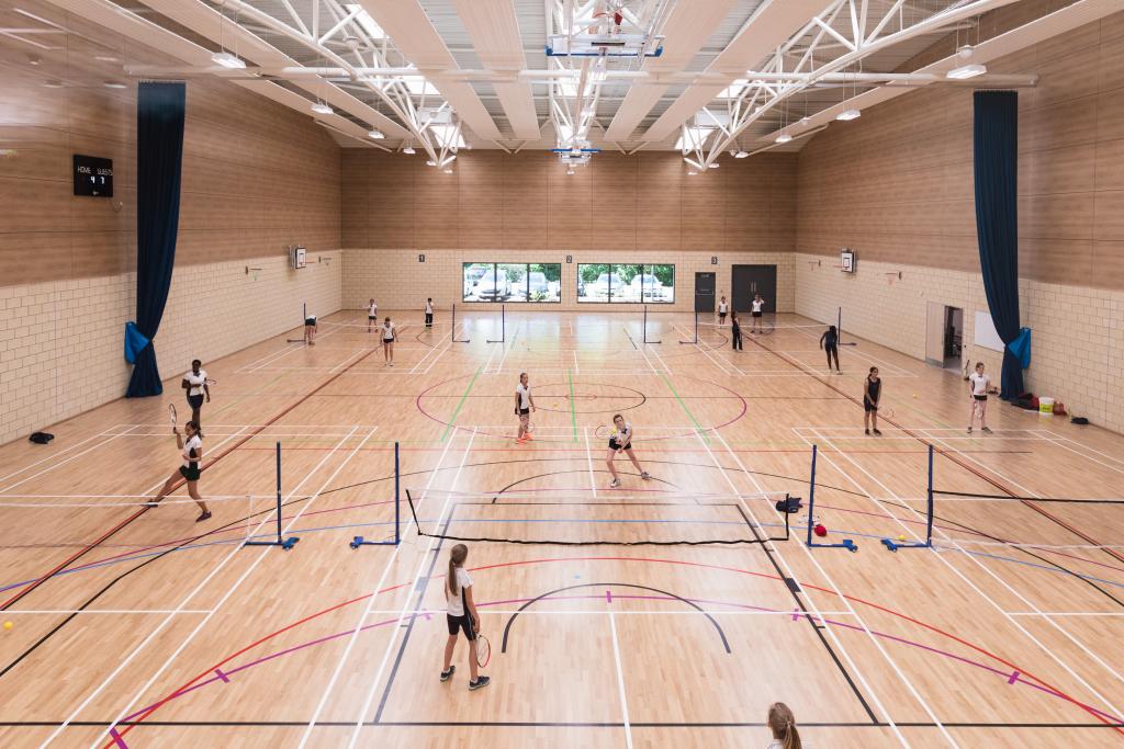 Sixteen pupils play badminton in their new sports hall, during the launch of the new Health and Fitness Centre at Cheltenham Ladies' College