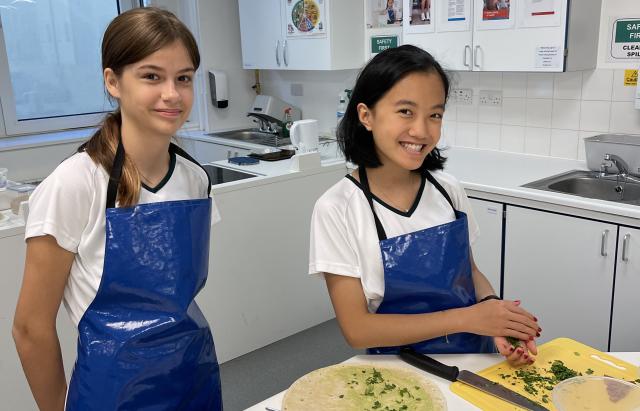 Year 9 students of Spanish making burritos