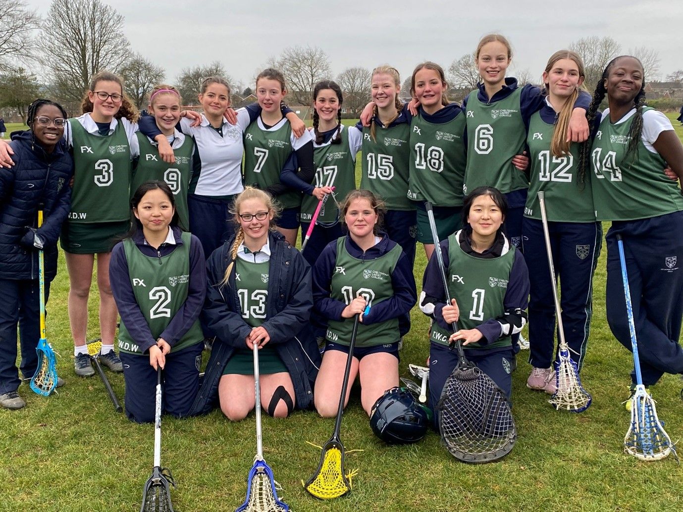 15 CLC students in the U15 lacrosse team pose with their lacrosse sticks